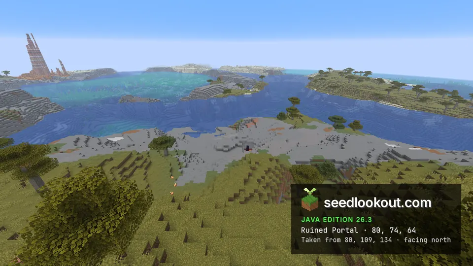 Bare stone shore below a savanna slope, with islands across the water and tall badlands spires far left