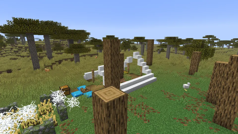 A ruined white-wool tent, chests and cobwebs in a naturally generated abandoned camp