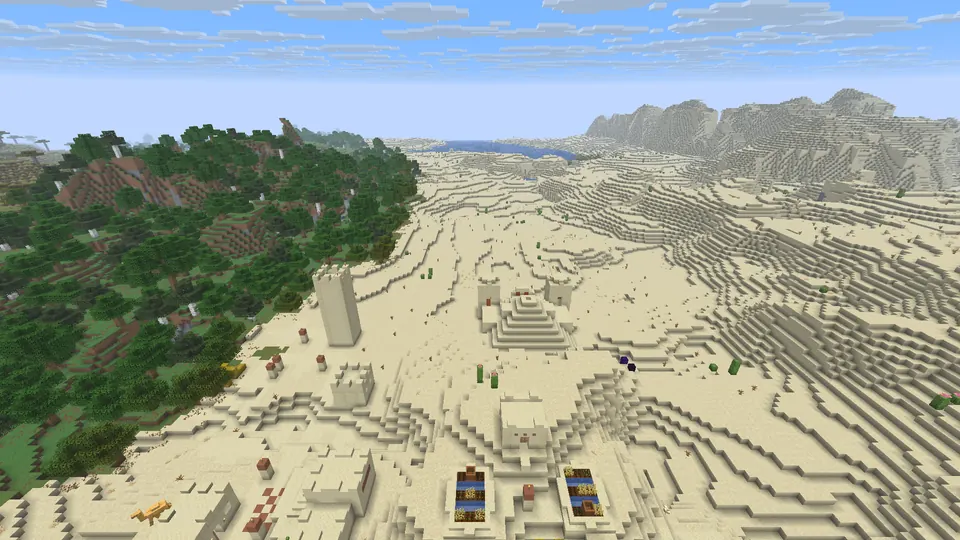 Desert village houses in the foreground, the pyramid and a tall sandstone pillar beyond, forest to the left