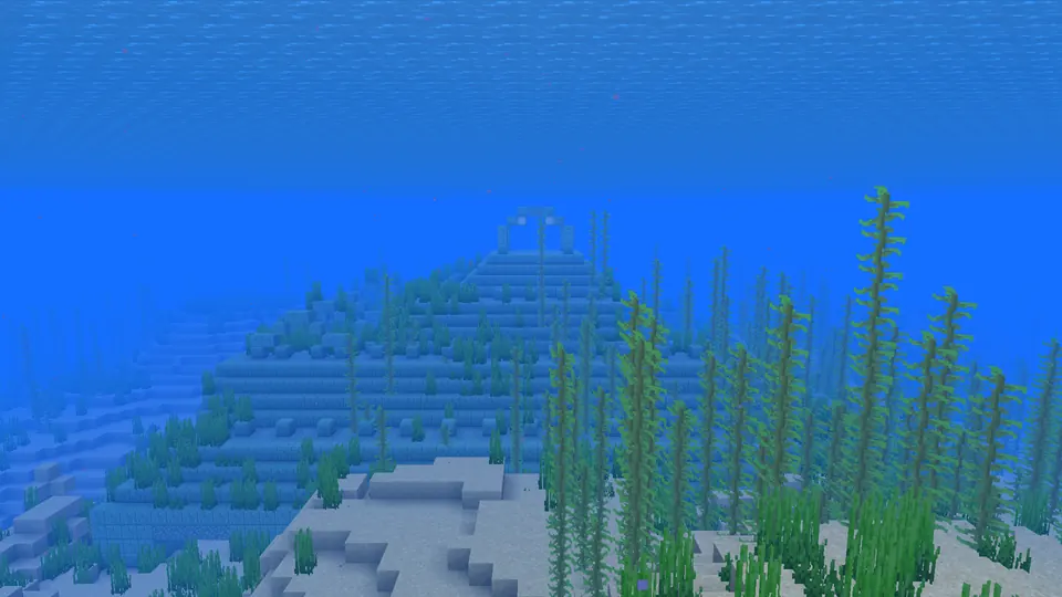 The stepped prismarine walls and roof of an ocean monument viewed underwater