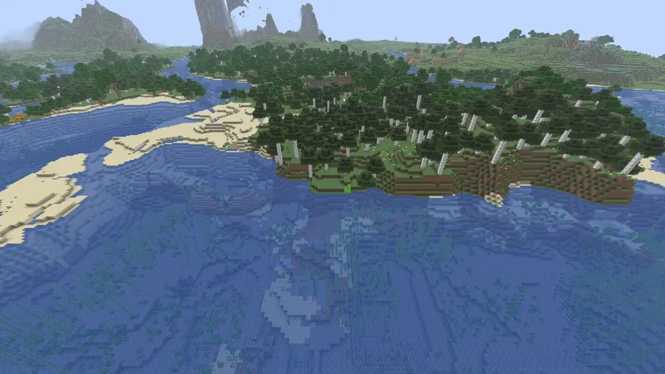 Oak and birch forest on a low shore with sandy spits, mountains and stone spires behind