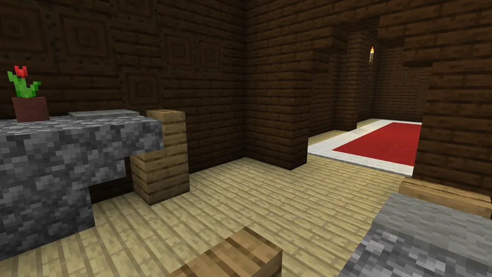 Flower pot and cobblestone counter in a naturally generated small mansion room